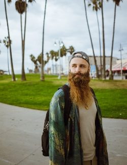 bearded-traveler-on-pavement-in-city-2022-03-04-06-19-35-utc.jpg